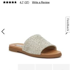 Beautiful rhinestone Steve Madden slides. Brand new with tags.